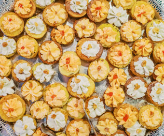 DailyDish's bliss potatoes hors d'oeuvres served on a silver platter with tongs. Catering Franklin TN